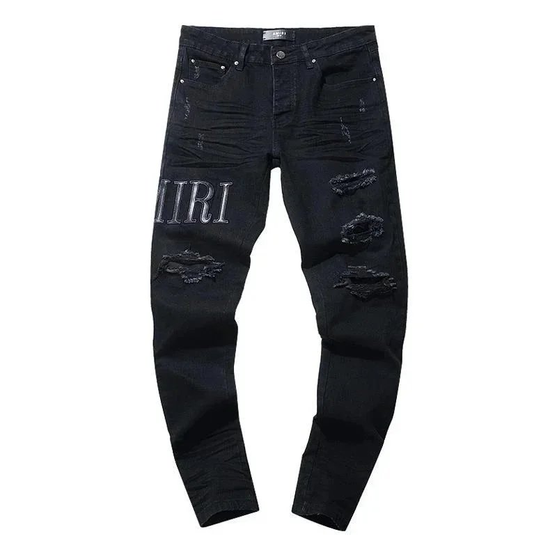 Amiri Tie-dye Core Logo-embroidered Jeans In Black