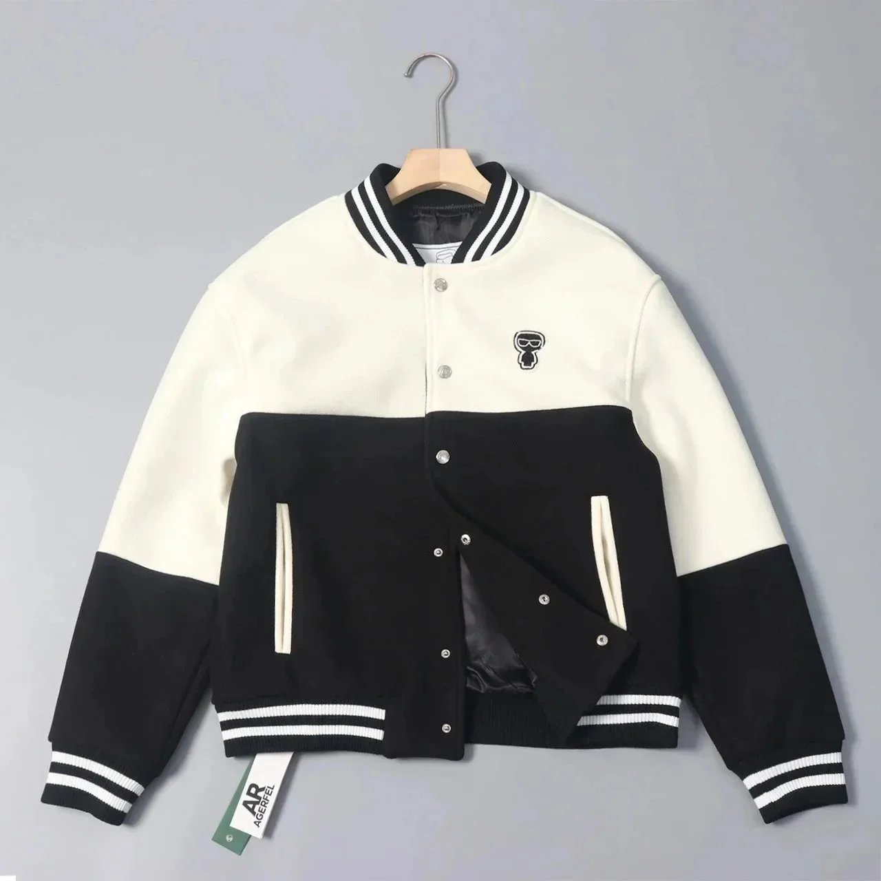 Stylish Black and White Varsity Jacket with Skull Logo