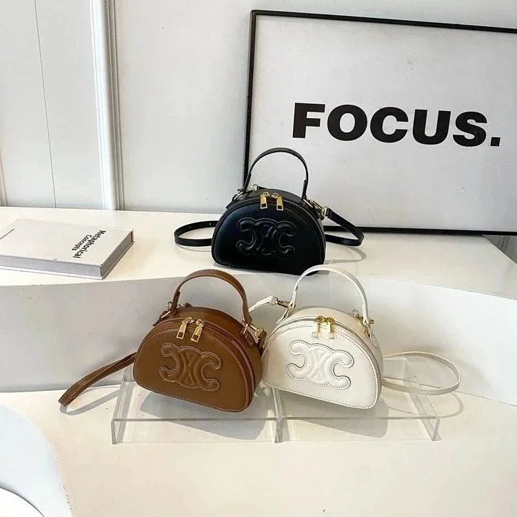 Celine Mini Oval Bag in Black Brown and White Leather