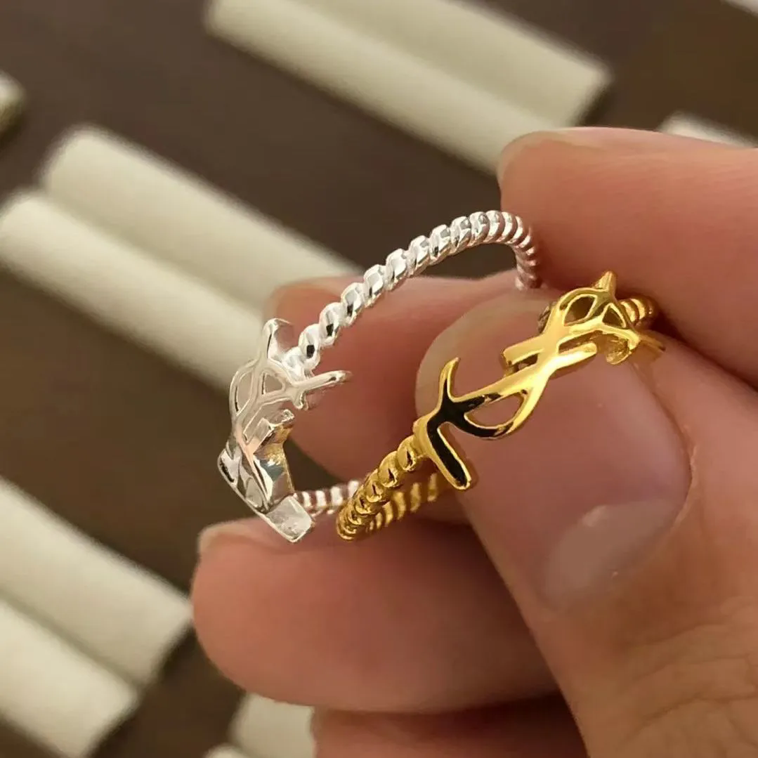 Saint Laurent YSL Logo Ring in Gold and Silver