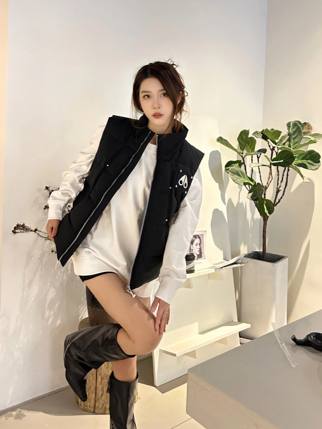 Black Quilted Sleeveless Vest with Zipper and Logo Patch