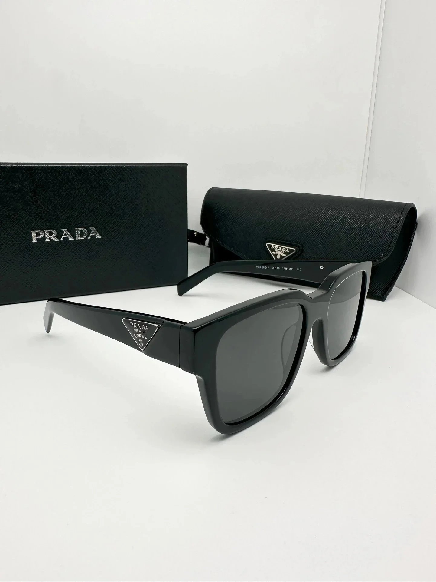 Prada Black Square Sunglasses with Triangular Logo