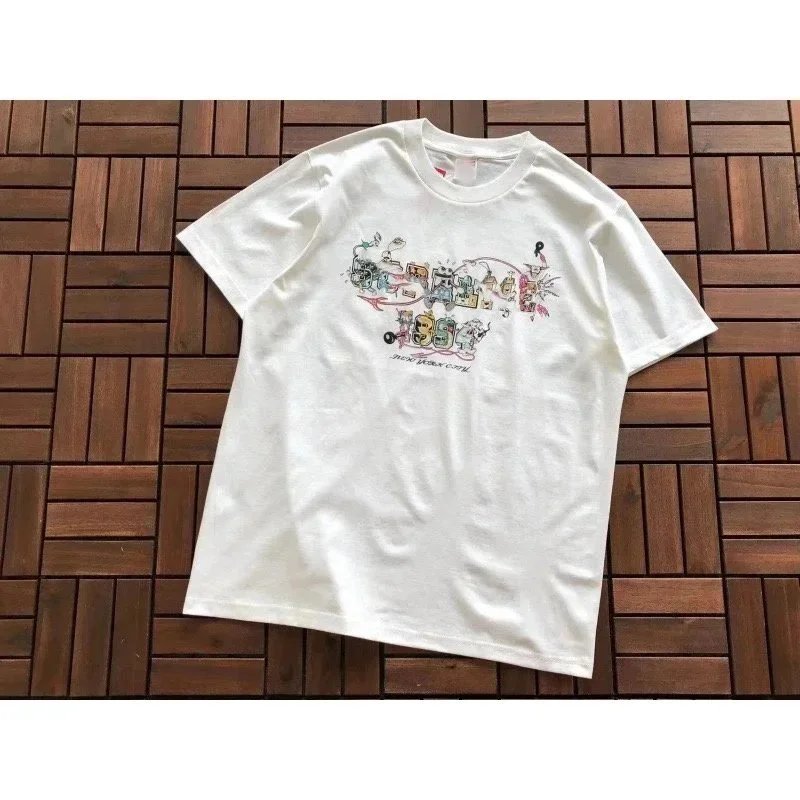 MOSCHINO White Graphic T-Shirt with Colorful Logo Design